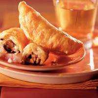 Serveersuggestie Empanadillas met paddestoelen en garnalen